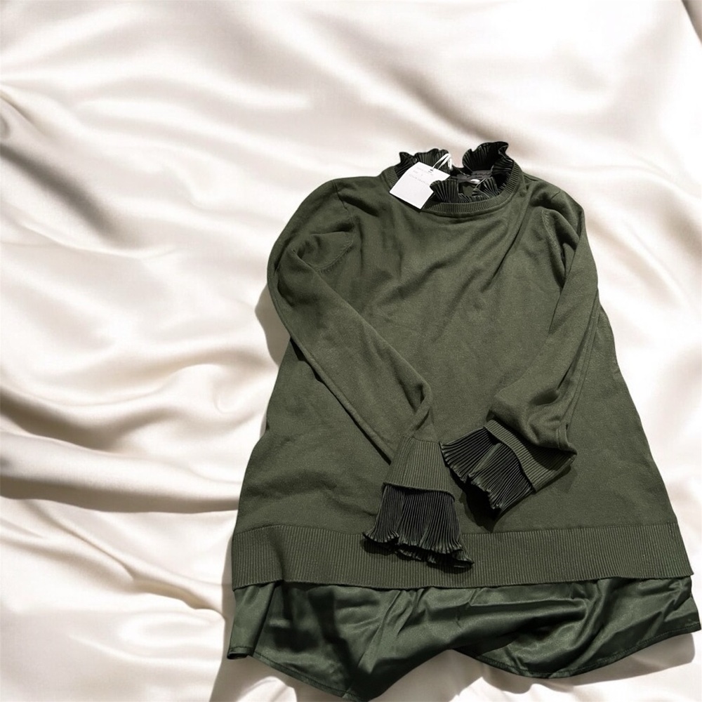 Green embellished sweater